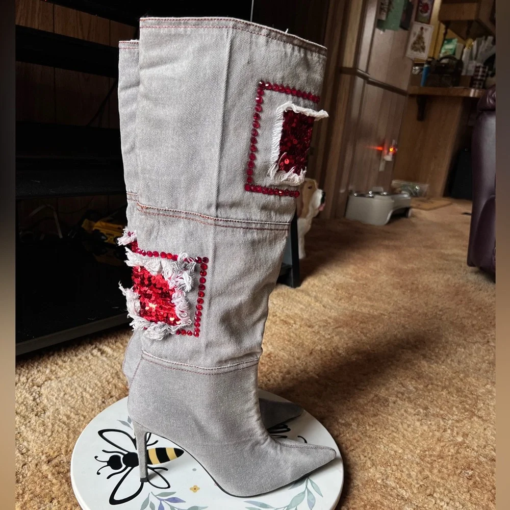 Woman’s multi-color red stone denim pointy toe knee-high boots.